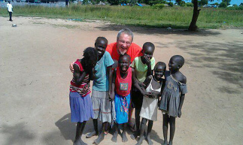 School in Sudan. George Hendry with Sudanese children in Bor Town