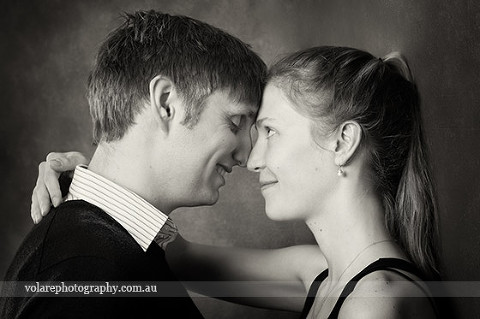 Couples Photography. woman looking at man lovingly. Black and white photography. Relationship Couples portraits studio in Melbourne Beloved