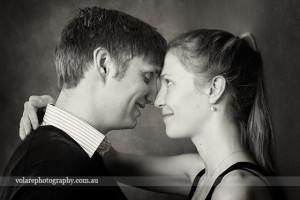 woman looking at man lovingly. Black and white photography. Relationship Couples portraits studio in Melbourne Beloved