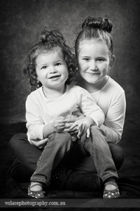 Melbourne sisters two young girls relationship portraits black and white studio photography