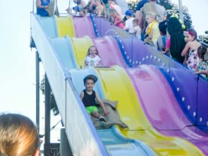 Kids having fun on slide Frankston festival of Lights