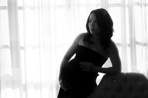 Black and white silhouette of pregnant woman