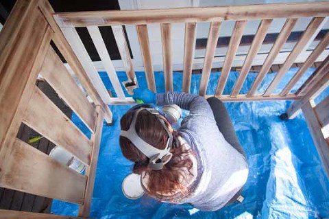 Getting ready for birth. Nesting. Painting the cot Maternity photos