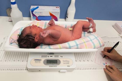 Child Birth Photography Melbourne Weighing baby monash medical centre
