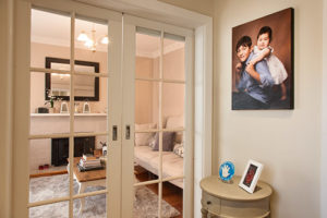 Portrait of brother and sister kids on wall