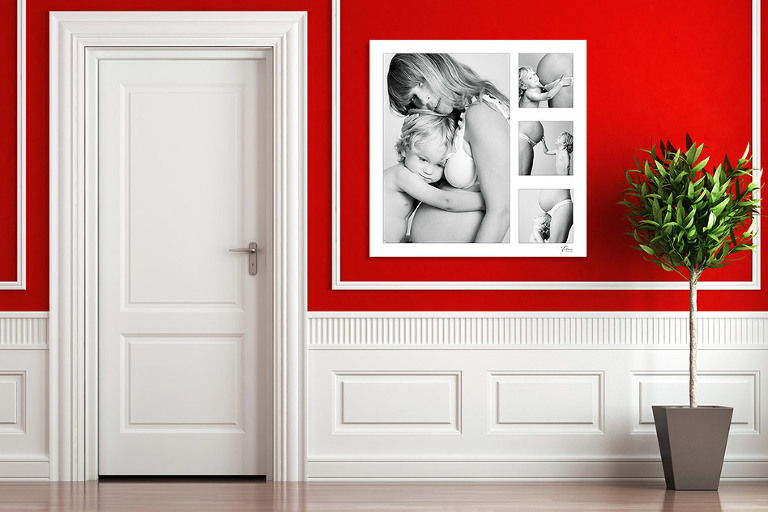 Matenity photos with toddlers hangin on red wall at home