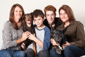 Happy family photography with dogs and older boys
