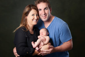 Happy portrait of newborn and family studio melbourne