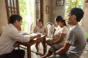 Family of young girl with hearing impairment Vietnam OGCDC