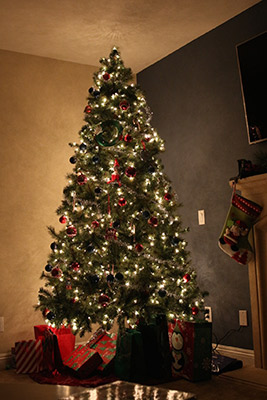 Christmas tree with lights presents on Christmas Eve