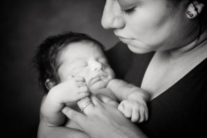 Natural Newborn photography Mum holding newborn Melbourne